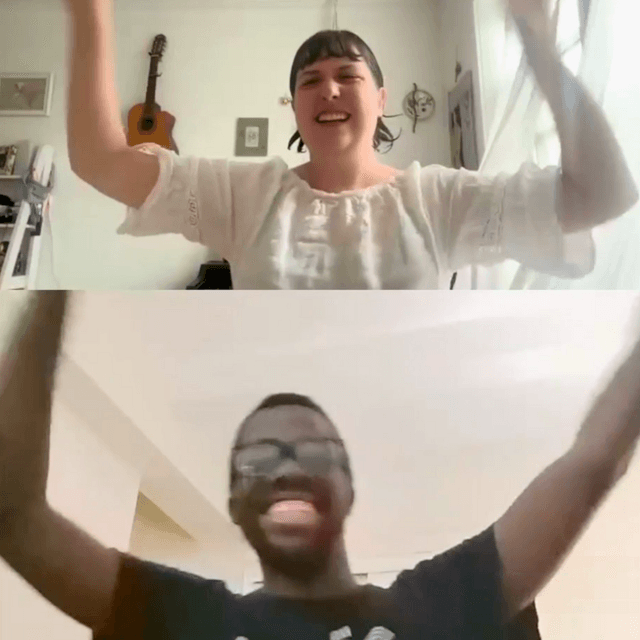 Photo of Stef and a member at an online dance party with their hands up